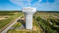 Ominous abandoned structures behind Riverridge water tower aerial