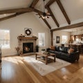 Open concept living room with fireplace wooden beams black door frames and autumn colors Royalty Free Stock Photo