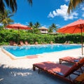 Outdoor tourism landscape. Luxurious beach resort with swimming pool and beach chairs or loungers under umbrellas with Royalty Free Stock Photo