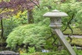 An image of a pagoda for a pond with old Acers in different colors in the Japanese garden in park Clingendael, the Hague Royalty Free Stock Photo