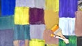 Image of paint brush on abstract painting