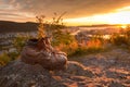 A Pair of Worn Hiking Boots at Sunset Royalty Free Stock Photo