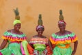 Image of Palenqueras with bright cloths and pineapples on their heads in Cartagena, Colombia Royalty Free Stock Photo
