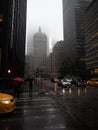 Image of Park Avenue on a rainy and foggy day. The Helmsley Building can also be seen in the background. Royalty Free Stock Photo