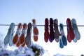 Image of pegs on a washing line with snow sky background Royalty Free Stock Photo