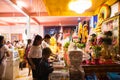 Image of people in buddhist temple paying respect to monks. Religious celebration. Royalty Free Stock Photo