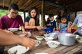 Image of people in the countryside in Cambodia. Khmer family having lunch with traditional food. Royalty Free Stock Photo