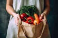 Image Of Person Holding Reusable Shopping Bag Filled With Fresh Fruits And Vegetables, Promoting Ecofriendly Shopping Habits. Royalty Free Stock Photo
