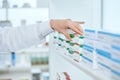 image of a pharmacist taking a box of medicine. Royalty Free Stock Photo