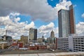 Picture of a downtown city with skyscrapers and industrial buildings