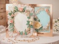 The image of a picture frame adorned with a stunning floral pattern creates an enchanting display on the table.