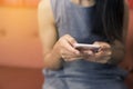 This image is a picture of a woman using a mobile phone. The concept is technology,working woman. Royalty Free Stock Photo