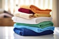 image of a pile of neatly folded towels on a laundry basket Royalty Free Stock Photo