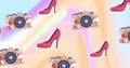 Image of pink high heels and cameras on colourful background Royalty Free Stock Photo