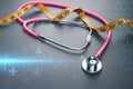 Image of pink stethoscope, measurement tape and heartbeat pulse. medical and healthcare diagnostic concept. Healthy lifestyle and