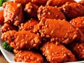 A plate of crispy fried chicken wings with dipping sauce. Royalty Free Stock Photo