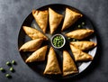 Plate of vegetable spring rolls with peas and Royalty Free Stock Photo