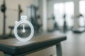 Stopwatch icon in gym interior, fitness and time tracking concept Royalty Free Stock Photo