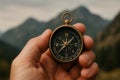 Hand Holding Vintage Compass Against Mountain Landscape For Navigation And Adventure Royalty Free Stock Photo