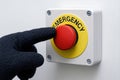 Gloved Hand Pressing Red Emergency Stop Button, generative ai Royalty Free Stock Photo