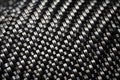 Close up of woven black and silver carbon fiber material texture Royalty Free Stock Photo