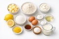 Baking Ingredients for Lemon Dessert on White Surface Royalty Free Stock Photo