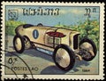 Postage stamp, Laos 1984, sports car, mail, philately, postcard, collection, hobby, engine, technology, rally, sport, Royalty Free Stock Photo