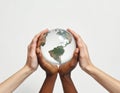 Diverse Hands Gently Holding the Earth Globe Royalty Free Stock Photo
