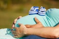 Image of pregnant woman touching her belly with hands Royalty Free Stock Photo