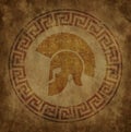 Spartan helmet an icon on old paper in style grunge, is issued in antique Greek style.