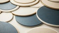 A 3D rendering of a collection of overlapping circles in various shades of blue, gray, and beige. Royalty Free Stock Photo