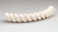 A white spiral-shaped object with a shiny surface. Royalty Free Stock Photo