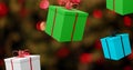 Image of presents falling over fairy lights at christmas