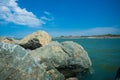 Coastal Serenity: Rocky Shoreline Meeting Azure Waters Royalty Free Stock Photo