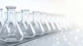 A row of empty test tubes on a conveyor belt. Royalty Free Stock Photo