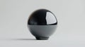 A shiny black sphere with a reflective surface. Royalty Free Stock Photo