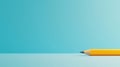 A yellow pencil with a sharpened tip rests on a blue surface. Royalty Free Stock Photo
