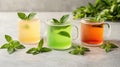 Three glasses of iced tea with mint leaves, arranged in a row. Royalty Free Stock Photo