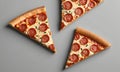 Three slices pepperoni pizza with golden crusts and melted cheese are arranged diagonally on gray background. Royalty Free Stock Photo