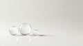 Three spheres of varying sizes are arranged in a line on a white background. Royalty Free Stock Photo