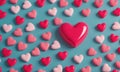 collection pink and red heart-shaped objects arranged in grid-like pattern against blue background. Royalty Free Stock Photo