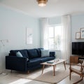 Pretty simple decor of living room with blue sofa and light blue wall