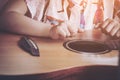 Image processing color tone instagram. Close-up child playing guitar. Concept of liftstyle, learning, hobby, musician, dream and i Royalty Free Stock Photo