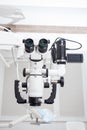 Image of a professional dental endodontic binocular microscope with a camera in the treatment room Royalty Free Stock Photo