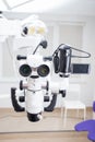 Image of a professional dental endodontic binocular microscope with a camera in the treatment room Royalty Free Stock Photo