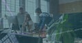 Image of programming language over diverse colleagues discussing over computer in office Royalty Free Stock Photo