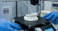 3D Printing Dental Model with Blue Gloves Royalty Free Stock Photo