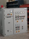 Image of pump control panel on concrete floor. Royalty Free Stock Photo