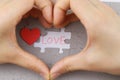 Image of Puzzle piece with love and red love hand Royalty Free Stock Photo