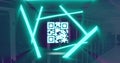 Image of qr code flashing with neon green lights over computer servers
